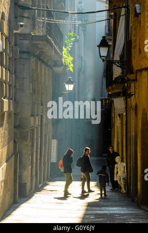 A narrow street in the Gothic Quarter Barcelona Spain Stock Photo