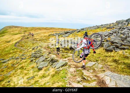 Riders descending Ingleborough in the 2015 Three Peaks cyclocross race, an annual event over three Yorkshire mountains Stock Photo