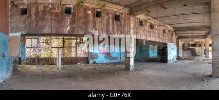Gagra, Abkhazia, Georgia - April 3, 2016: Panoramic view of the interior of abandoned dilapidated shopping center "Zhoekvara" Stock Photo