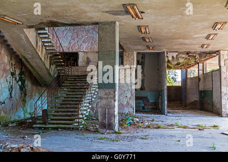 Interior of abandoned dilapidated shopping center "Zhoekvara" in Gagra, Abkhazia Stock Photo