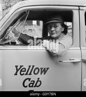 Miss Mary E. Steiner, Driver for the Yellow Cab Company, Philadelphia, Pennsylvania, USA, by Jack Delano for Office of War Information, June 1943 Stock Photo