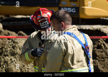 Irving, TX, USA 5th May, 2016. Rescuse workers on the scene of a trapped construction worker who had fallen into a 12 ft. deep trench.  Credit:  Brian Humek/Alamy Live News. Stock Photo