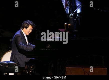 Chinese pianist Lang Lang performs music during the shooting of