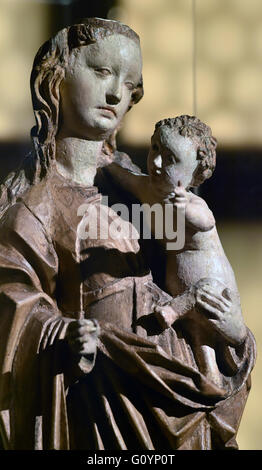 The wooden sculpture 'Madonna of Kadan' (1493) from the Chomutov Regional Museum can be seen in the new temporary exhibition from the Chemnitz Art Collection in the Schlossbergmuseum in Chemnitz, Germany, 06 May 2016. The exhibition 'Saxony and Bohemia as Reflected in Art around 1500' was created in cooperation with the National Gallery in Prague. Valuable artworks from the Czech Republic, sculptures, books, and ritual items show that, despite the existence of the border through the Ore Mountains since the middle of the 15th century, the space of Saxony-Bohemia is seen by its residents as a cu Stock Photo