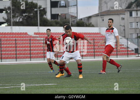 Gibraltar - 6th May 2016 - Lincoln Red Imps were officially crowned as the Gibraltar Football League Champions for the 14th consecutive season. Lincoln who led the table with 8 pointshad already claimed the title with last weeks win. They nevertheless added a further 3 points to their tally beating Manchester 62 4-0. Lincoln Red Imps will now play in the UEFA Champions League first round qualifiers.They received their 14th league title shield after the match. Credit:  Stephen Ignacio/Alamy Live News Stock Photo