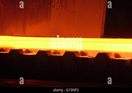 Industry steel, Hot slab on conveyor Stock Photo