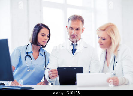 team or group of doctors on meeting Stock Photo