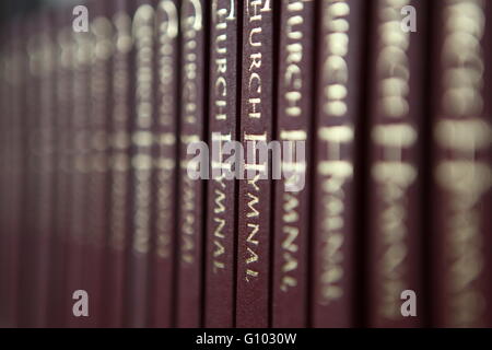 Hymn books in a Catholic Church in Ireland Stock Photo