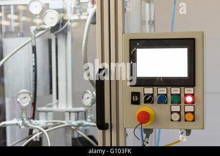 Control panel of production line with buttons Reset, Start and Stop. The screen of this device is white - ready for your text. Stock Photo