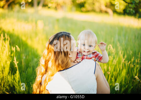 Boy waving goodbye Stock Photo