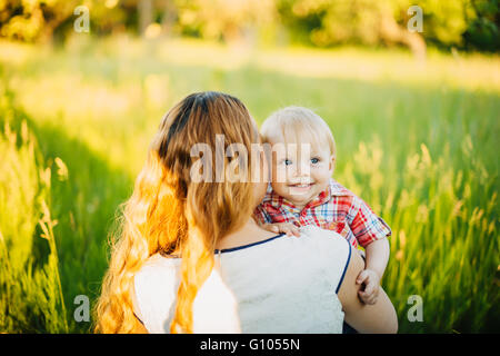 Mom hugging her son Stock Photo