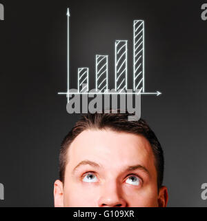 male head with rising bar chart Stock Photo