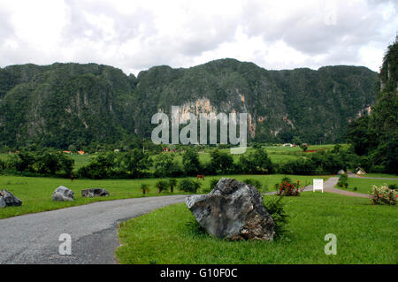 Sweeping view of Valle de Vinales Cuba. Farm houses and mountains, Vinales Valley, UNESCO World Heritage Site, Cuba, West Indies, Caribbean, Central America. Stock Photo