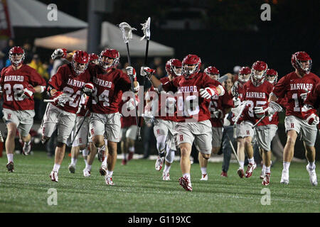 Stevenson-Pincince Field. 6th May, 2016. RI, USA; Harvard Crimson players charge the field after defeating the Brown during the NCAA Ivy League Tournament Lacrosse game at Stevenson-Pincince Field. Harvard defeated Brown 13-12. Anthony Nesmith/Cal Sport Media/Alamy Live News Stock Photo