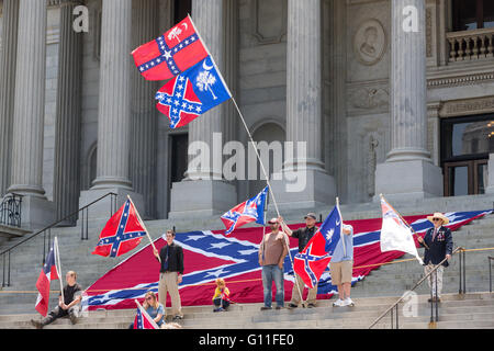 Columbia, South Carolina, USA. 07th May, 2016. Costumed confederate re-enactors rally on the steps of the State House to celebrate Confederate Memorial Day May 7, 2016 in Columbia, South Carolina. The events marking southern Confederate heritage come nearly a year after the removal of the confederate flag from the capitol following the murder of nine people at the historic black Mother Emanuel AME Church. Credit:  Planetpix/Alamy Live News Stock Photo