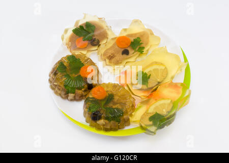 freshly cooked meat jelly on a plate with a white background Stock Photo