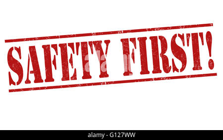 Safety first grunge rubber stamp on white background, vector illustration Stock Photo