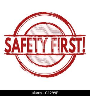 Safety first grunge rubber stamp on white background, vector illustration Stock Photo