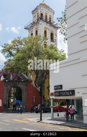 NH Puebla hotel, a European class hotel with Igelsia de San Agustin in the historic center of Puebla, Mexico Stock Photo