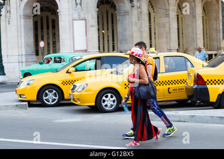 HAVANA - APRIL 27: People, cars and buildings in Old Havana (Havana ...