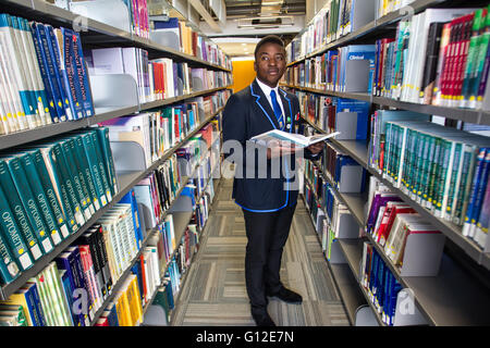 Black student enjoying lessons and studying Stock Photo