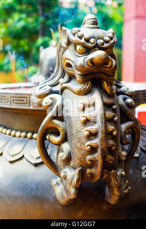 South East Asia, Vietnam, Ho Chi Mihn City (Saigon), Cholon, Quan An pagoda, dragon detail on incense burner Stock Photo