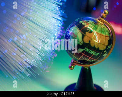 world map technology style against fiber optic background Stock Photo