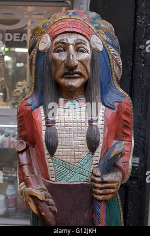 A cigar store Indian sculpture outside of the Classic Smoke shop in Greenwich Village in New York City. Stock Photo