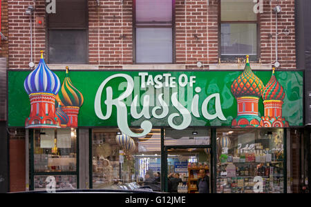 Sign for the TASTE OF RUSSIA food store on Brighton Beach Avenue under the el in South Brooklyn, New York. Stock Photo