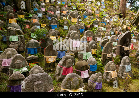 Thousands statues of Jizo, the guardian monk, Japan Stock Photo