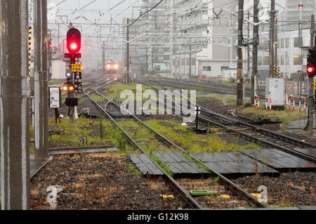 Rainy day at the  railway station, Japan Stock Photo