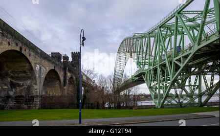 The Silver Jubilee (Runcorn) Bridge & Runcorn railway bridge (Runcorn side). Stock Photo