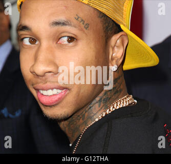 Celebrities attend BARBERSHOP: THE NEXT CUT premiere at TCL Chinese Theatre in Hollywood.  Featuring: Tyga Where: Los Angeles, California, United States When: 06 Apr 2016 Stock Photo