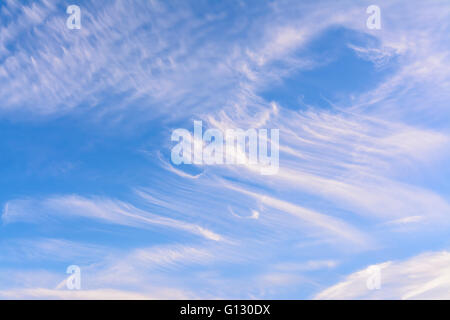 Cirrus clouds against blue sky on a Summer's day. Stock Photo