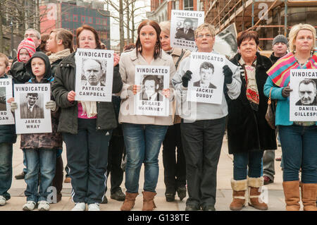 Londonderry, Northern Ireland. 30 Jan 2011 - Family members hold up pictures of their relatives killed on Bloody Sunday during a commemorative march. Stock Photo