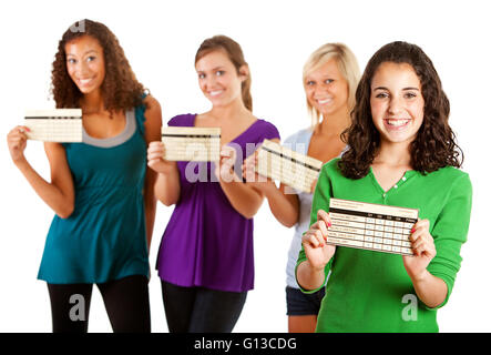 Part of an extensive series with high school students in a multi-ethnic group.  This part is isolated on white. Stock Photo