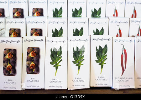 Boxes of flavored crackers in grocery store Stock Photo