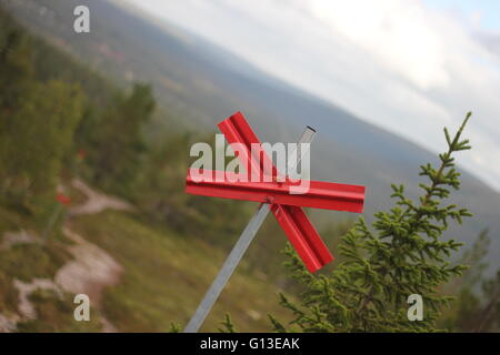 Ski trail marking in Sweden at unusal angle. Stock Photo