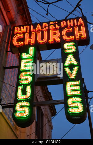 The 1940 neon sign to the Philadelphia Church on Chicago's north side Andersonville neighborhood in a former bank building. Stock Photo