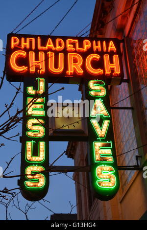 The 1940 neon sign to the Philadelphia Church on Chicago's north side Andersonville neighborhood in a former bank building. Stock Photo