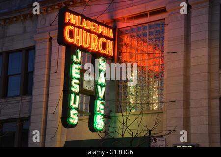 The 1940 neon sign to the Philadelphia Church on Chicago's north side Andersonville neighborhood in a former bank building. Stock Photo