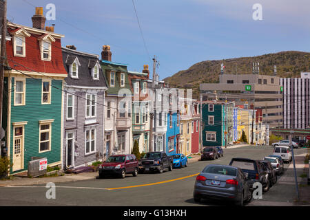 Pastel coloured row houses (Jellybean Row) in downtown St. John's, Avalon Peninsula, Newfoundland, Canada. Stock Photo