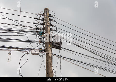 Messy electrical cables in Chiang Mai, Thailand Stock Photo