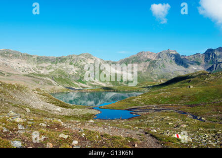 Europe, Switzerland, Graubunden, Engadine, mountain lake in the Unterengadin Stock Photo