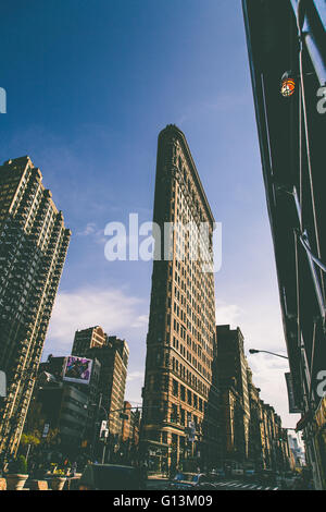 NEW YORK, USA - MAY 4, 2016: Flat Iron building facade in New York City. Completed in 1902, it is considered to be one of the fi Stock Photo