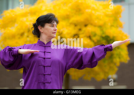 Woman performing Tai Chi in Scotland Stock Photo
