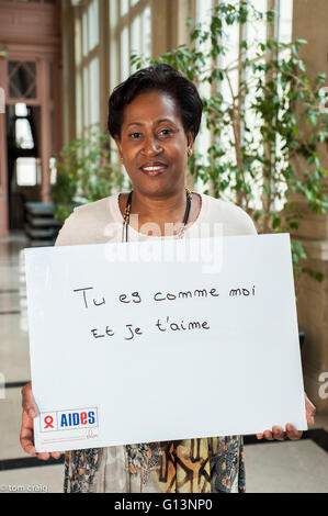 Paris, France, AIDS NGO AIDES, French Politician, woman Holding Protest Signs Against Discrimination, International Day Against Homophobia, 'You are like me, and I love you' IDAHOT Stock Photo