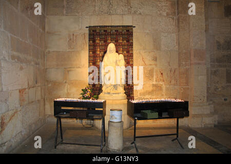 Statue of Mary inside the church of St. Anne, a Roman Catholic church, located at the start of the Via Dolorosa in Old Jerusalem Stock Photo