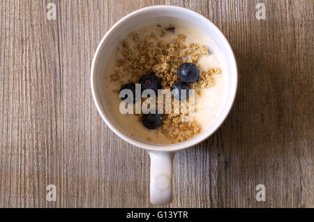 Cup of yougurt with blueberries Stock Photo