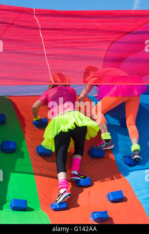 Poole, Dorset, UK. 8th May, 2016.  Foam Fest Dorset takes place at Baiter Park, Poole.  Runners dodge, dive, climb and laugh their way through a hilarious foam filled obstacle course for a 3k fun run organised by Naomi House and Jacksplace children’s hospices.  Credit:  Carolyn Jenkins/Alamy Live News Stock Photo